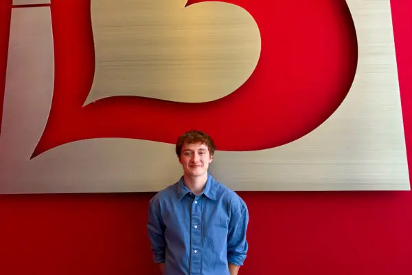 Aidan Flynn ’27 at the Burlington Stores office in Florence Township, New Jersey, for a team gathering.