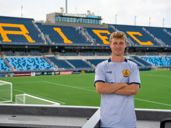 Photo of Robert Dwyer ’27 at Rhode Island FC’s home venue, Centreville Bank Stadium in Pawtucket.