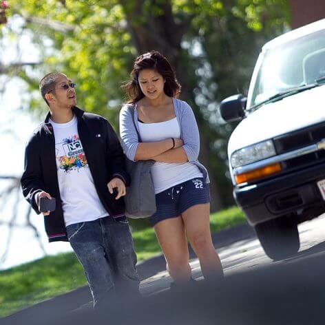 students walking through Nichols' campus