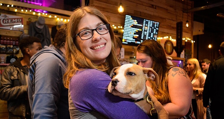 Cari Cyr posing with her dog