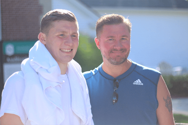 From left, freshman Nick Gonyea smiles with his father Brian Gonyea ’05 MBA ’17