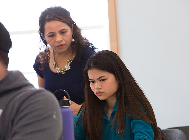 Nichols professor instructing a high school student who is participating in Nichols College's Accelerator Program.