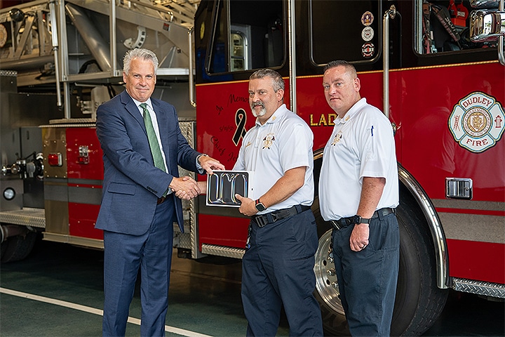Left to right: Nichols President Bill Pieczynski, Dudley Fire Department Chief Dean Kochanowski and Deputy Chief Erik Spahl