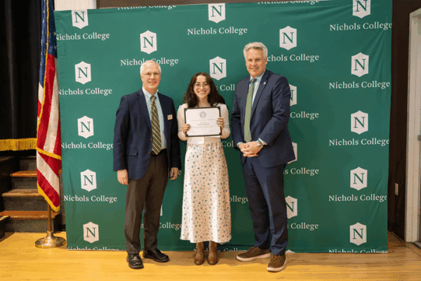 Professor Tom Davis, academic award recipient Natasha McClay and Nichols President Bill Pieczynski