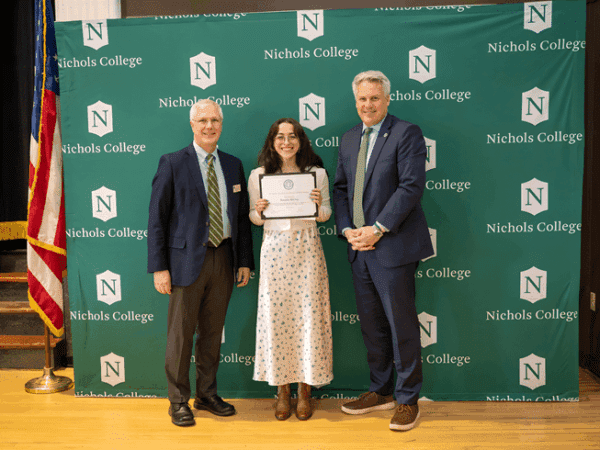 Professor Tom Davis, academic award recipient Natasha McClay and Nichols President Bill Pieczynski