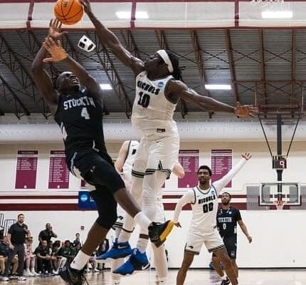 Nichols College men’s basketball player Matthew Alectus taking on Stockton in Pennsylvania on March 11