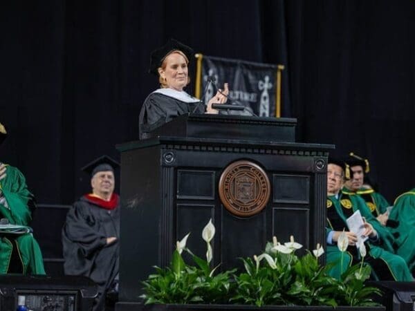 Anne Ackerley delivers the commencement address during the Nichols College 2025 commencement ceremony held on May 3 at the DCU Center in Worcester, Mass