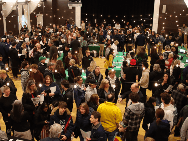 Students of the Class of 2027 meeting faculty and current students at Nichols College at the Admitted Students Reception on April 1, 2023