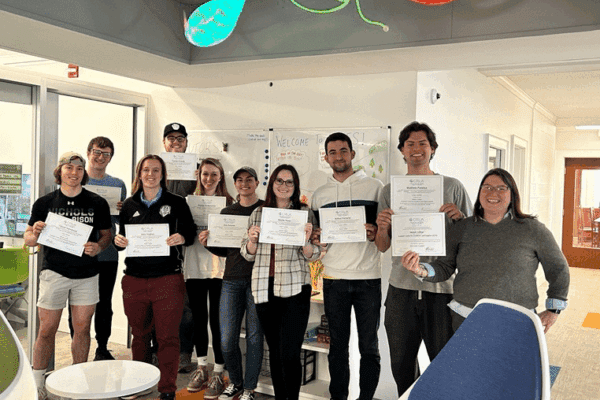 Academic Center for Excellence and Support (ACES) tutors holding their Level 1 certified tutor training certificate