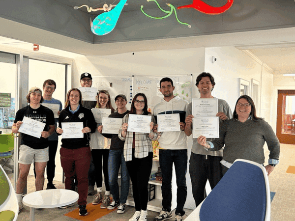 Academic Center for Excellence and Support (ACES) tutors holding their Level 1 certified tutor training certificate