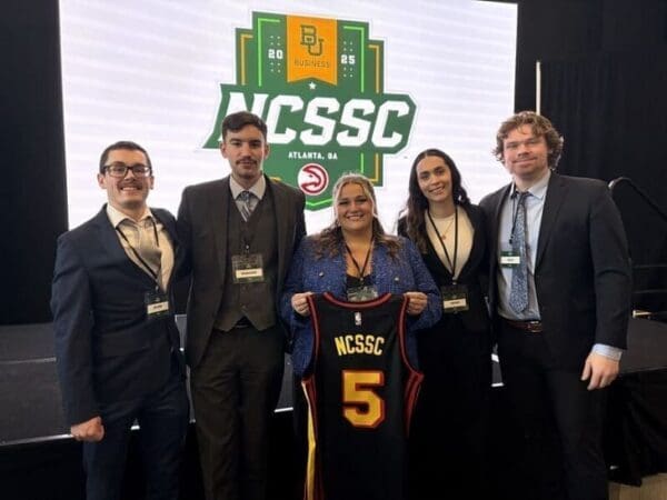 Jillian Archer ’25 (center) and fellow Nichols competitors Justin Janosz ’25, Ben Kallgren ’25, Jessica Volpi ’25 and Jack Ellis ’25 at the NCSSC in Atlanta
